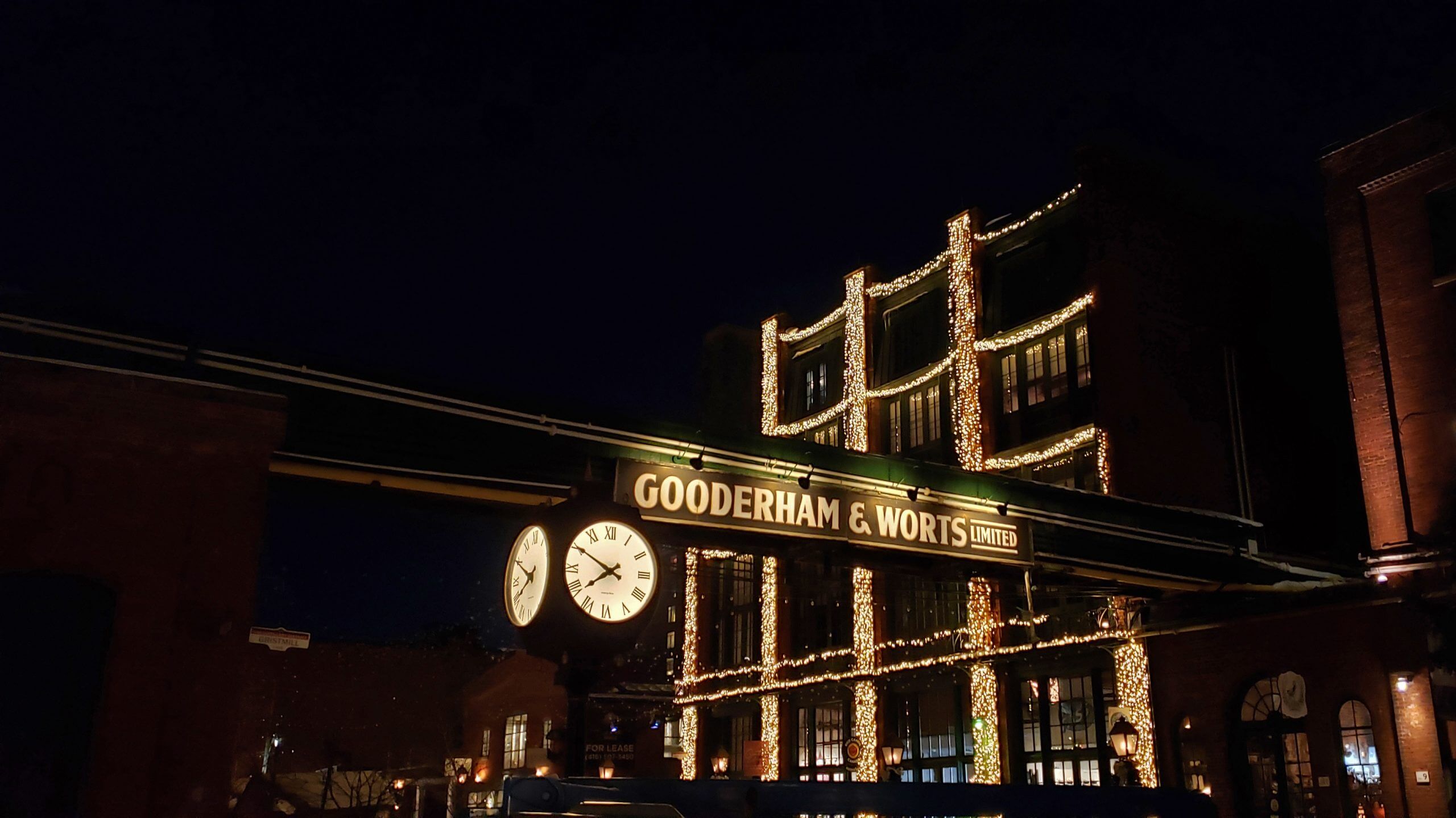 Trinity Street in the Distillery District lit up at night