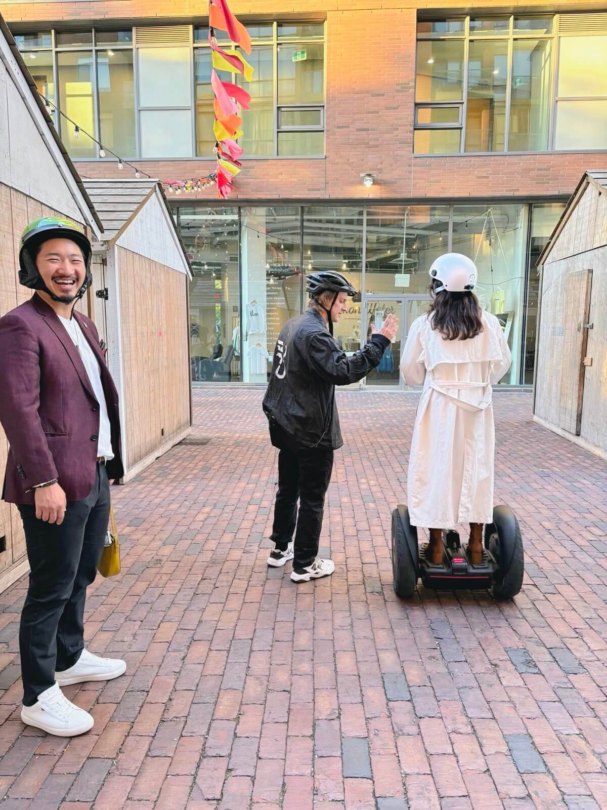 A couple celebrating a birthday party in the Distillery District with a Segway Tou